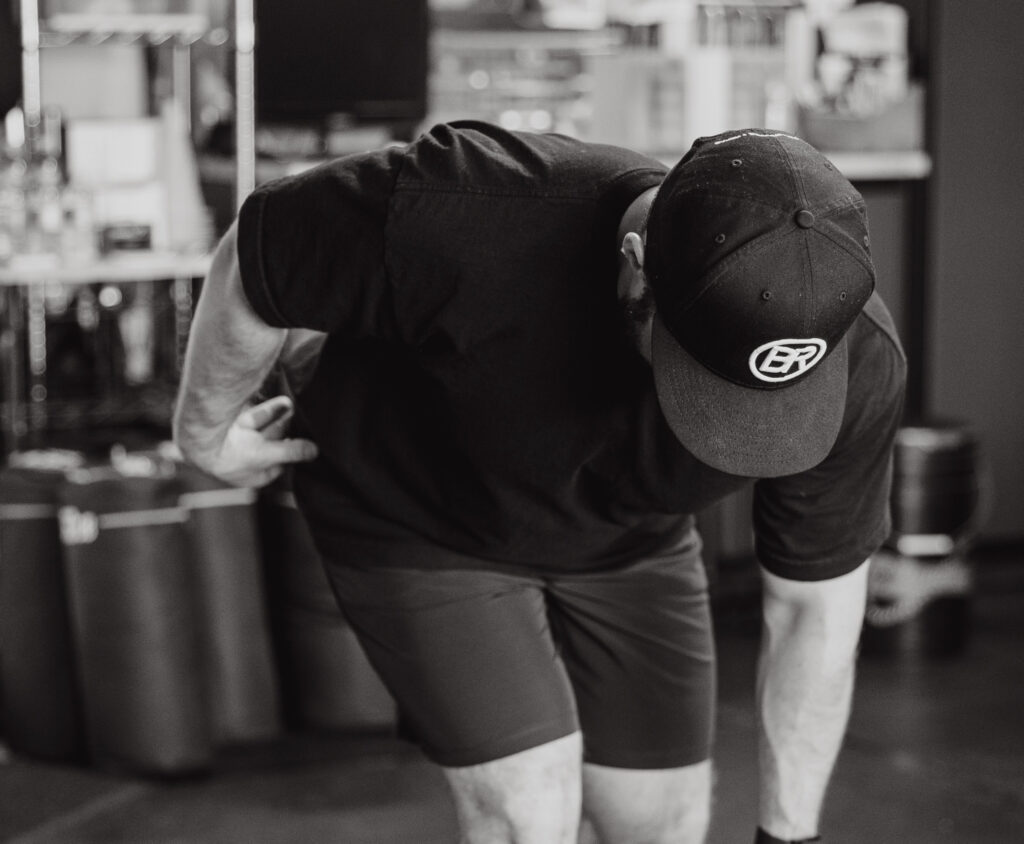 Physical therapist demonstrating proper technique for deadlift