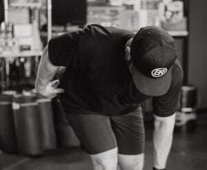 Physical therapist demonstrating proper technique for deadlift