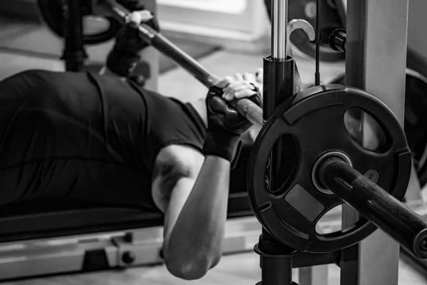 Athlete complaining of shoulder pain in the front after bench pressing
